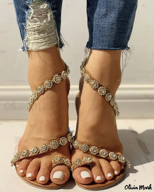 Flat sandals with toe ring and rhinestones